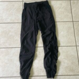 EUC Lululemon woman’s Black Dance Studio Mid Rise Joggers. Size 4.